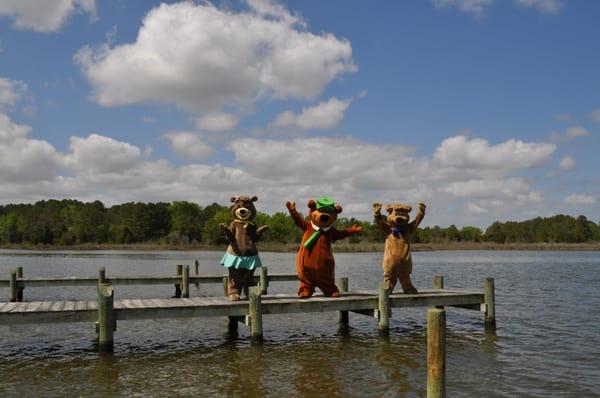 Yogi Bear, Boo Boo, and Cindy Bear on the pier