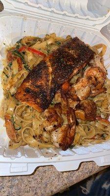 Blackened shrimp & salmon pasta with jerk sauce