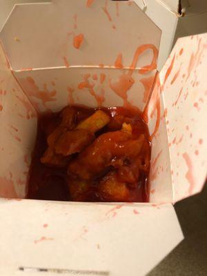 Sweet and sour chicken drowning in red sauce