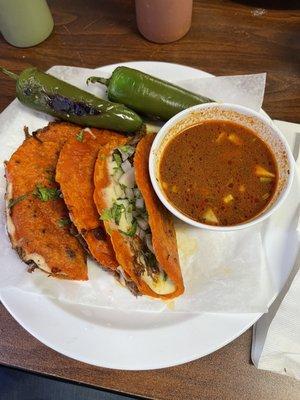 Quesobirria Tacos, 3, with consumé. Doesn't come with jalapenos. I added them.