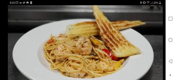 Garlic Shrimp in a white wine sauce served over linguine