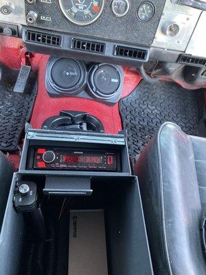 Custom Jeep lockable storage for stereo and amp plus custom speaker pods install