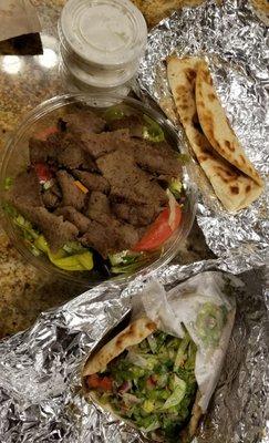 Medium greek salad with gyro and doner kebab sandwich