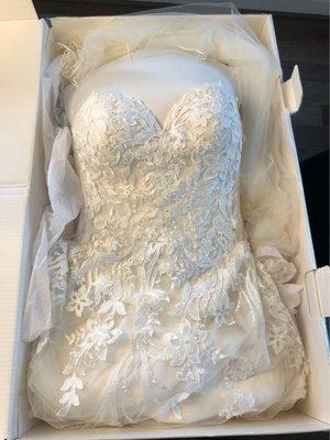 Cleaned + preserved wedding dress