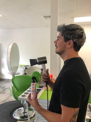 Cory our artistic director with the Dyson supersonic hair dryer.