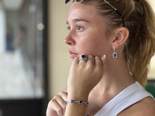 Tanzanite and diamond jewelry on a customer.