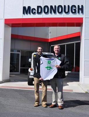 Steven Taetzsch presents Steve McDonough with a T-shirt and Ball for Sponsoring the Irish Road Bowling Event.