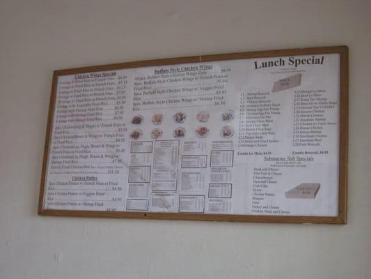 one of the menu boards inside (mainly, focused on chicken wings)