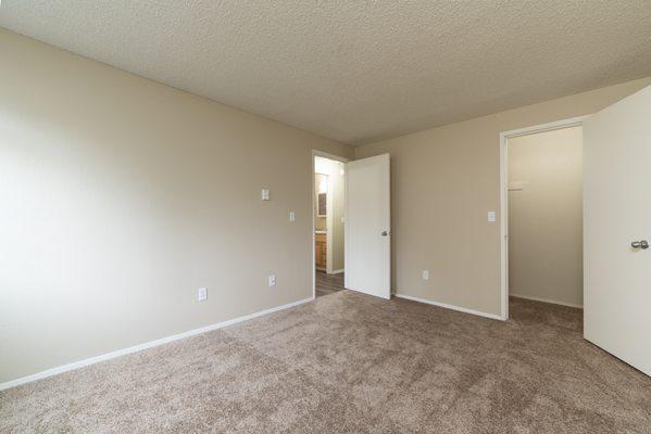 Step into tranquility. Our bedroom offers a peaceful escape, complemented by a walk-in closet for effortless organization.