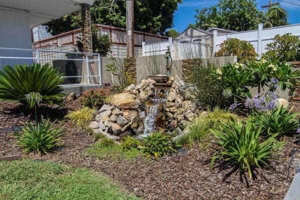 Peaceful waterfall in assisted living courtyard