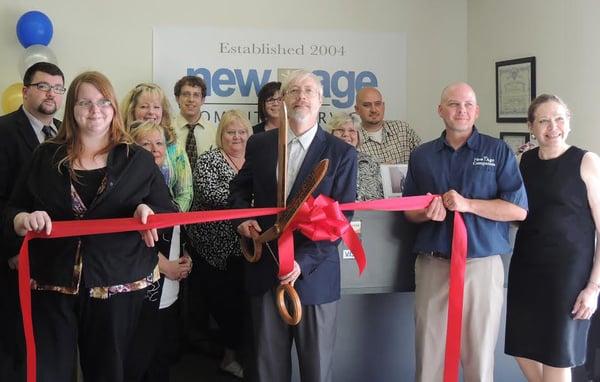 New Age's tenth anniversary as a Muncie business was celebrated in a ribbon cutting by the local Chamber of Commerce.