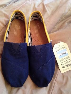 TOMS makes shoes in college colors. This is the UC Berkeley edition I purchased from the Berkeley Student Store.