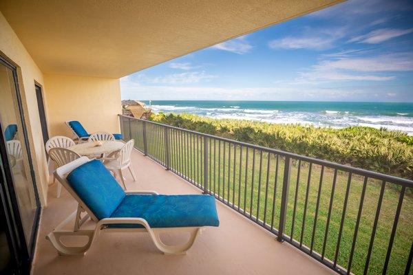 All units have a private balcony with a view of the ocean.