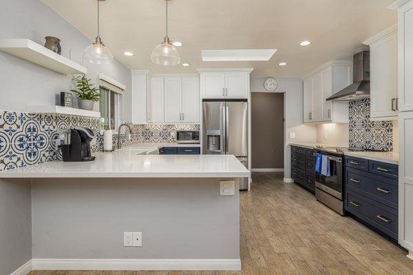 This California Coastal kitchen was renovated to brighten and open up this space with a peninsula.