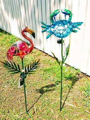 Solar powered lighted glass & metal yardstakes - just a couple of the many fun things we sell for your yard.