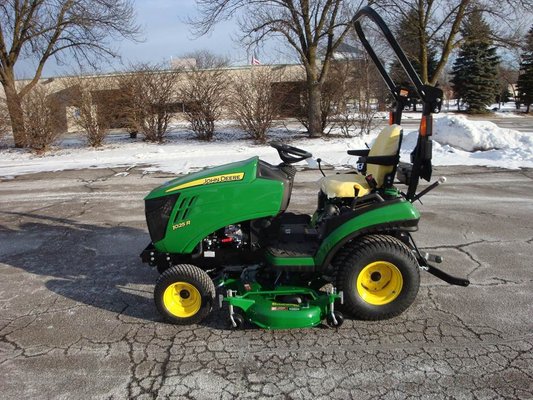 John Deere 1025R with mower deck, mulch kit, turf tires & rear hydraulics.