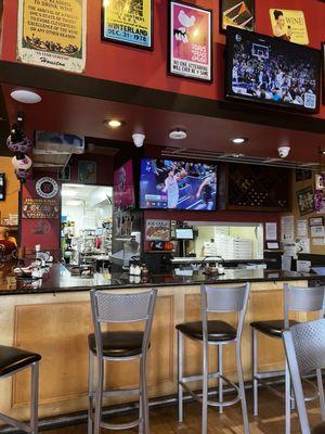 Inside view of the bar and kitchen half.