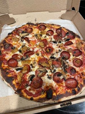 Sausage, mushroom, pepperoni pizza well done !