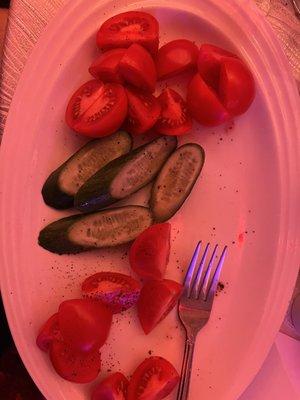 Uncooked tomatoes and cucumbers