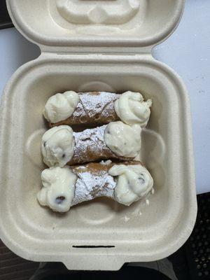 Canoli. Filled with a creamy sweet ricotta cheese.