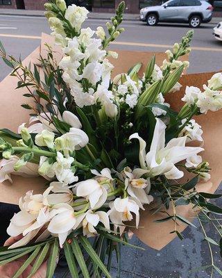 All white hand-tied bouquets have been all the rage this year!