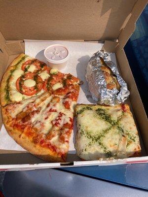 Caprese slice, Margherita Pesto slice, chicken parm slice, and an order of garlic knots....