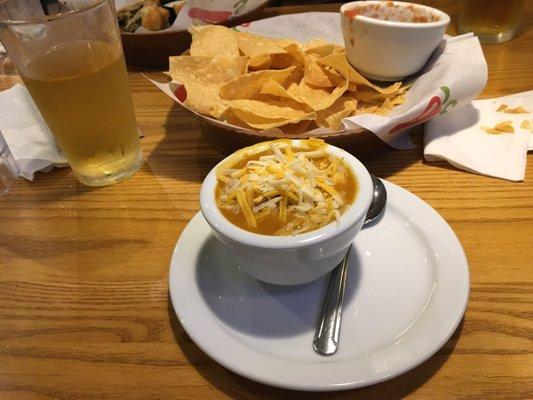 Chicken enchilada soup. Perfect with chips & cold beer.