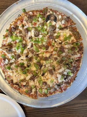 Beef, sausage, fresh mushrooms, green peppers and onion build your own 5 toppings pizza