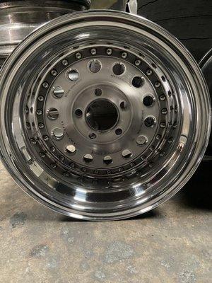 These centerline wheels used to be powder coated black-- we stripped and brushed the centers and polished the barrels.. ROMEROS polishing