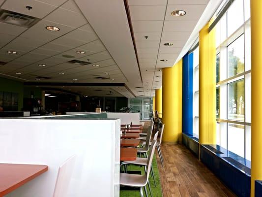 Floor to ceiling windows allow plenty of natural light to bathe the interior of the restaurant