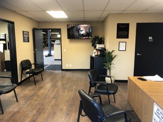 The waiting room has clean bathrooms, Tv to watch, and drinks for our guest.