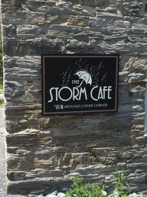 Storm Cafe sign when walking down the hill