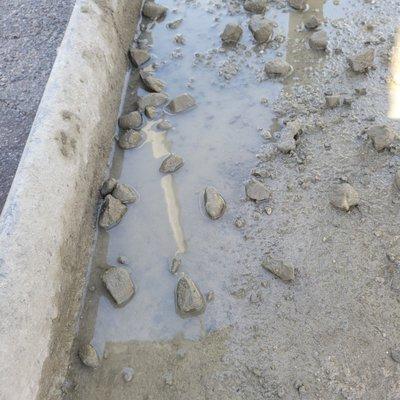 Large rocks in concrete