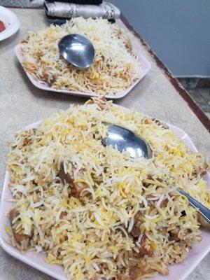 Mutton dum biryani (front), chicken dum biryani (rear)