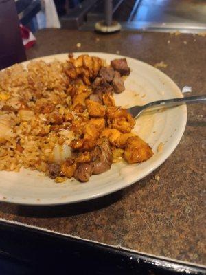 Yumyum sauce  with steak hibachi chicken. Eggs rice and vegetables with onion