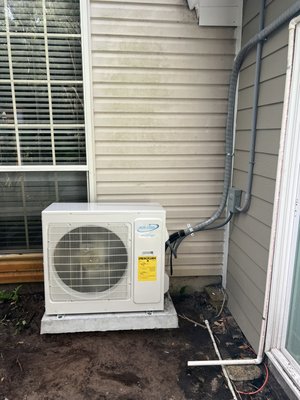 2 ton heat pump mini split out door condenser installed by the best Rene Heating & Air