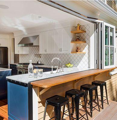 Bi fold windows are a great way to open up the kitchen area.