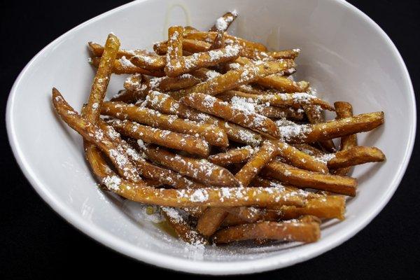 Sweet Potato Fries tossed with Powered Sugar and Honey