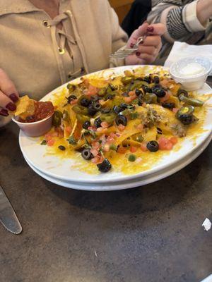 nachoes with a little bit of ground beef