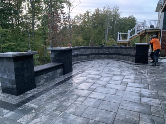 Light blue brick patio with black brick making a nice background.