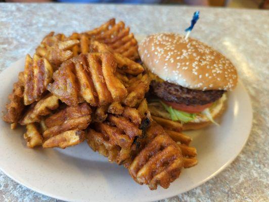 Burger. Seasoned fries.