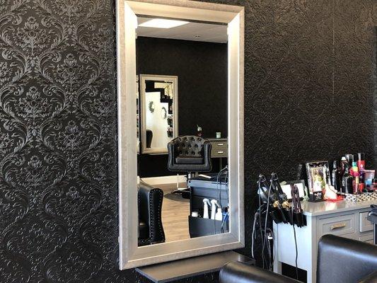 Eileen's station is the first one as you walk in the salon.