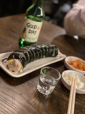 Tuna kimbap, side dishes and pineapple soju