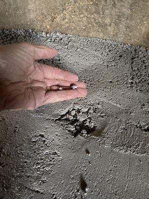 Shotcrete on basement storage area walls.