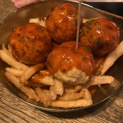 Buffalo chicken balls over fries