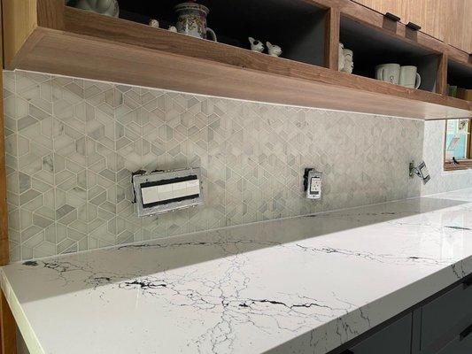 Wall tile and quartz countertop