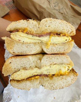 Everything bagel with egg, cheddar cheese, and turkey bacon