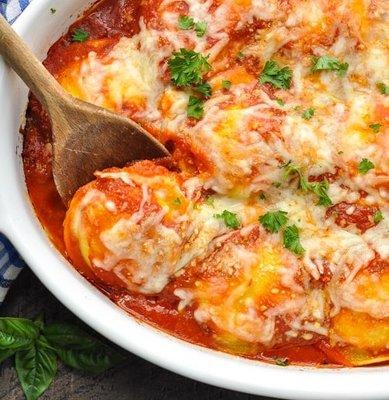 3 Cheese Baked Ravioli with breadsticks, House Blend Bread Dipping Oil, and Salad