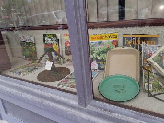 Magazines & vintage stuff in front window.