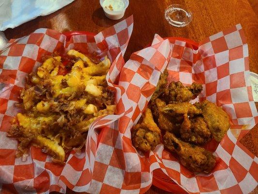 Bacon cheese fries and hot wings